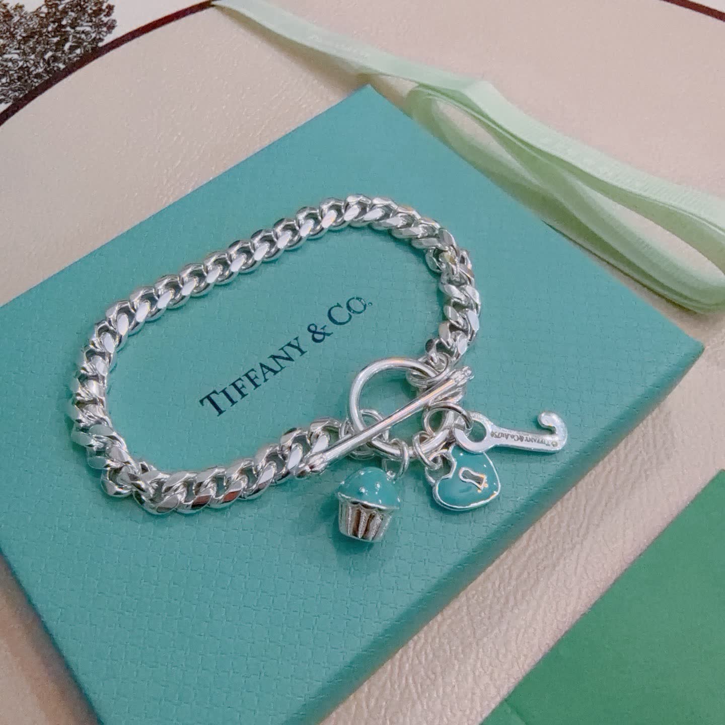 Tiffany & Co. Sterling Silver Heart Bracelet with Charms